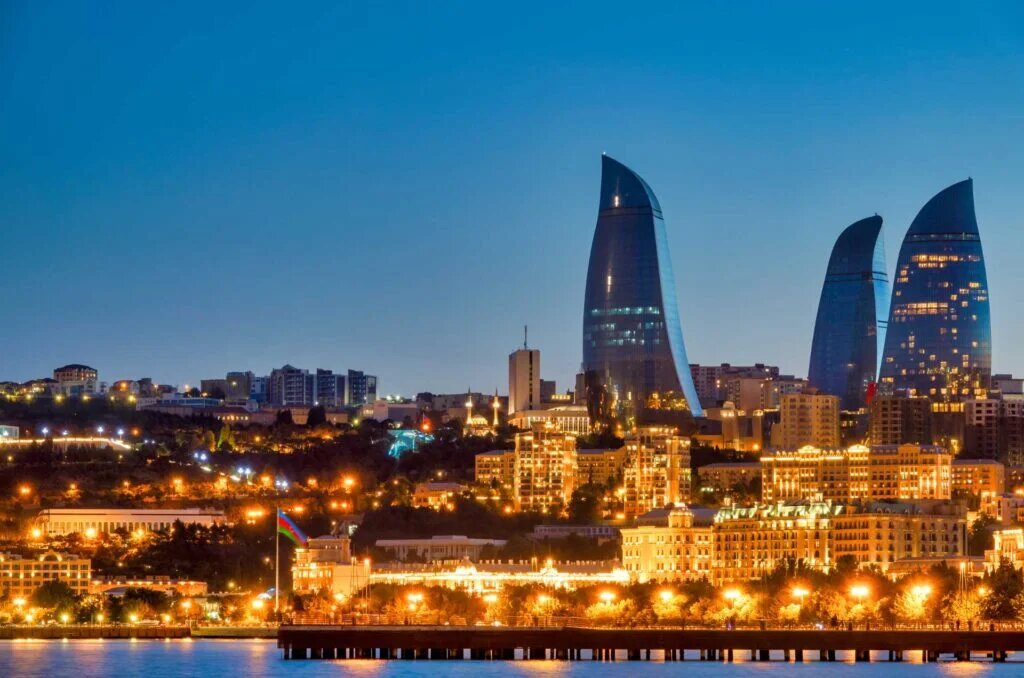 Baku skyline with the Flame Towers at sunset
